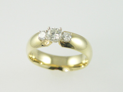 14KT Y/G Three Stone Diamond 0.69ct. - J- SI3 Band