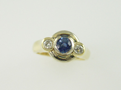 14KT White/Yellow Gold Bezel Set Sapphire 0.68ct Two Diamonds 0.28ct