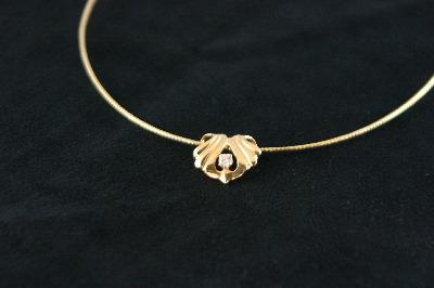 14KT Y/G Diamond 0.10ct Floating Heart Pendant