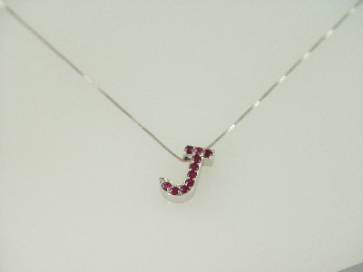 14KT Y/G Ruby 0.55ct "J" Pendant