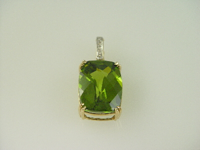 14KT Y/G Japaness Emerald Cut Periodet 53.70ct Enchancer Pendant