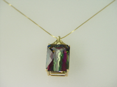 14KT Y/G Emerald Cut Mystic Topez 36.91ct Pendant
