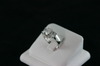 14KT White Gold 3 Stone Emerald Cut Cubic Ring