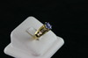 14KT Y/G Center Oval Tanzanite 1.43ct Baguette Diamonds 0.75ct Ring