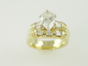 14KT Y/G Pear Shape Diamond 1.77ct H-I1- Baguette Diamonds 0.80ct Ring