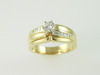 14KT Y/G Diamond Baguette 0.28ct., One Round Diamond 0.42ct Ring