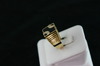 14KT Y/G Flat Onyx Channel Set Diamonds 0l.25ct Ring