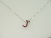 14KT Y/G Ruby 0.55ct "J" Pendant