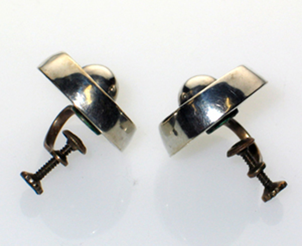 Screw back earrings dating