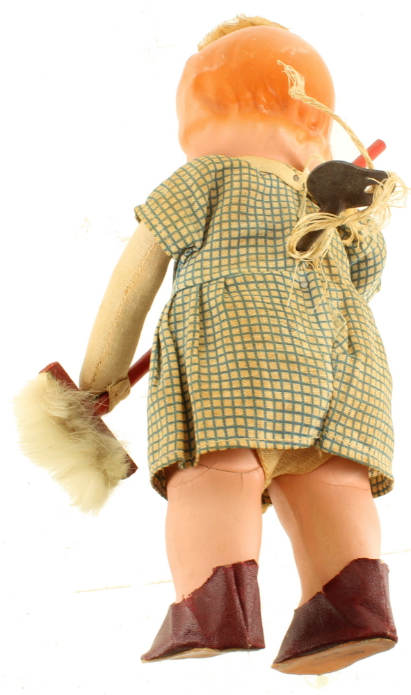 VINTAGE HORO COMPOSITE WIND UP TOY DOLL GIRL SWEEPING BROOM WEST
