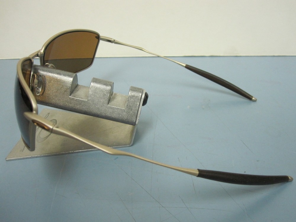 OAKLEY mens SQUARE WHISKER sunglass PLATINUM/BRONZE POLARIZED NEW IN