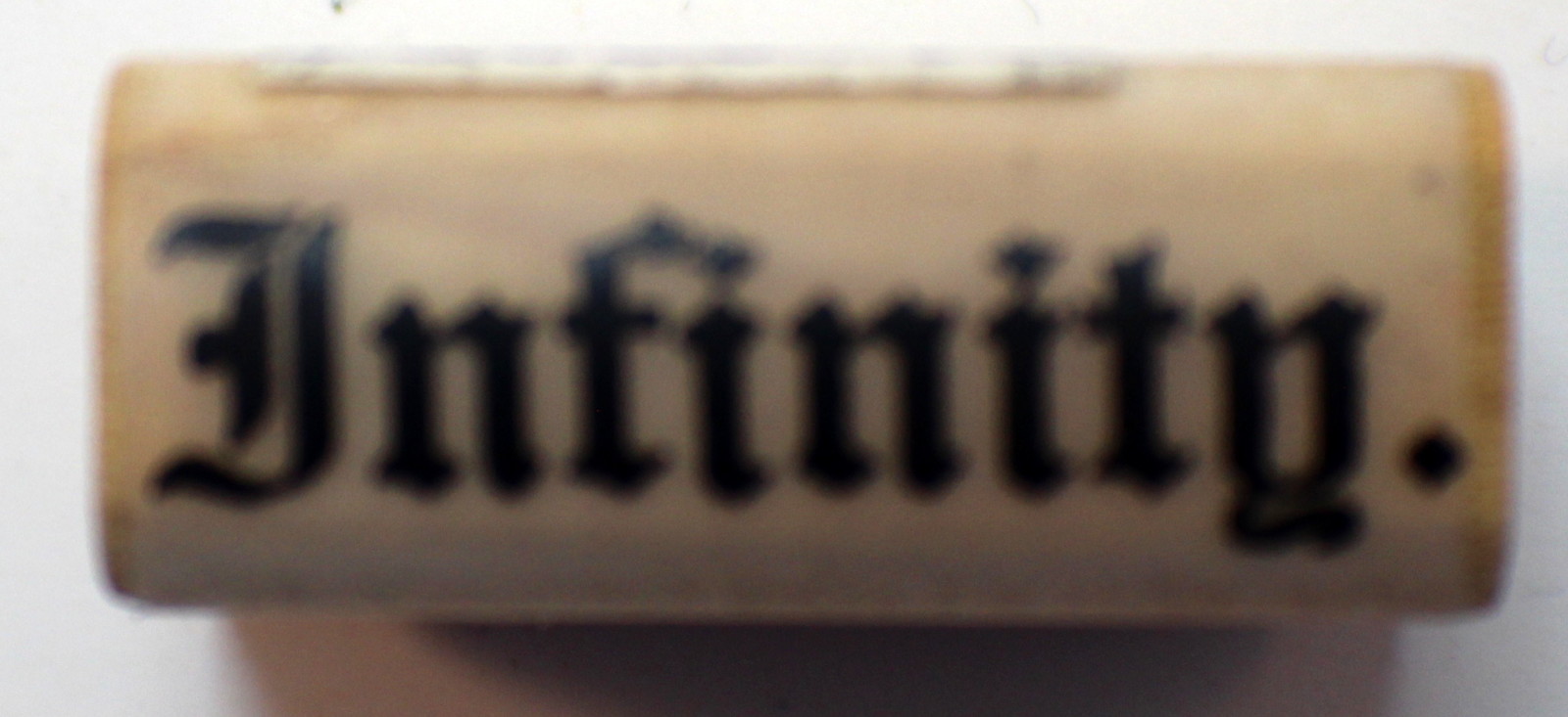 infinity word writing saying river city rubber works wooden rubber river city rubber works
