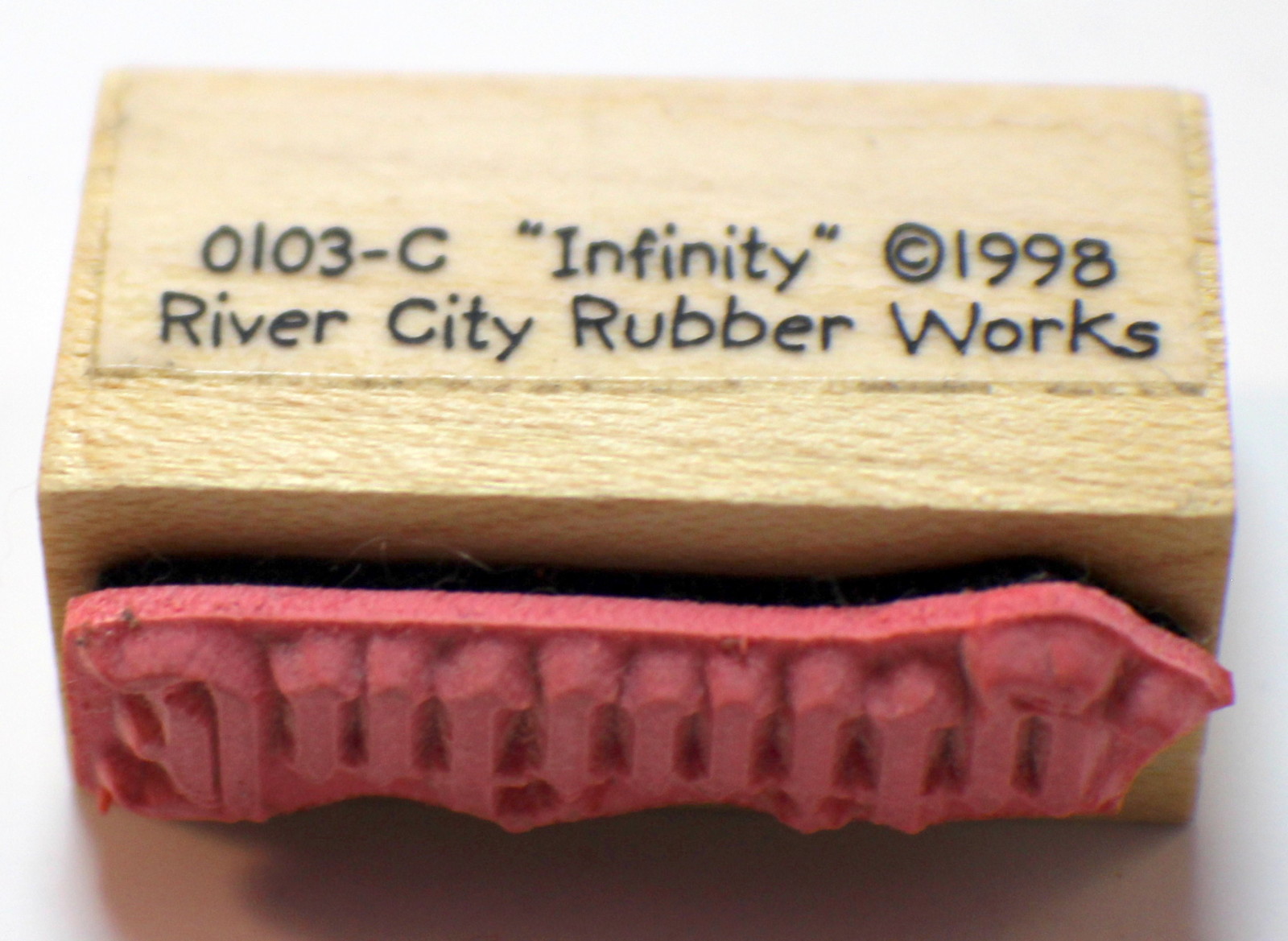 infinity word writing saying river city rubber works wooden rubber river city rubber works