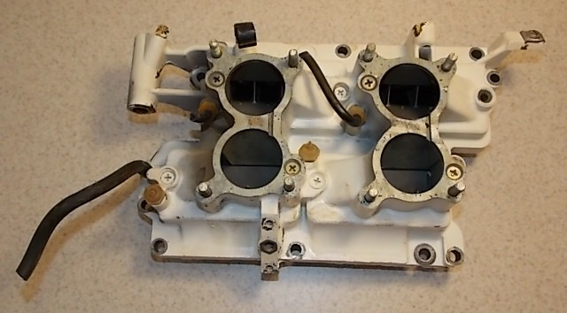 390454 389823 Johnson Evinrude 1980-95 Intake Manifold & Reeds 85 90 100 115+ HP