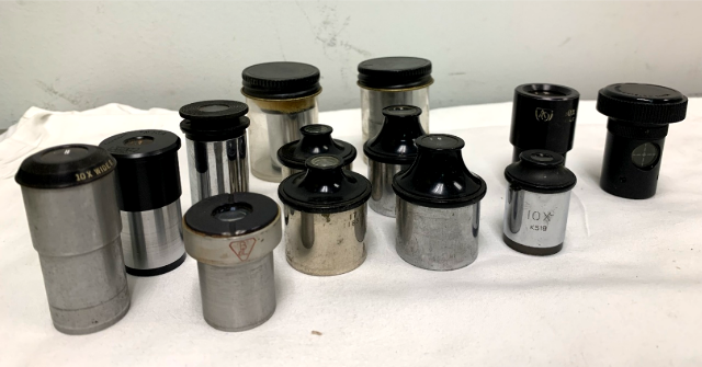 large lot of vintage Microscope Eye pieces and other parts.