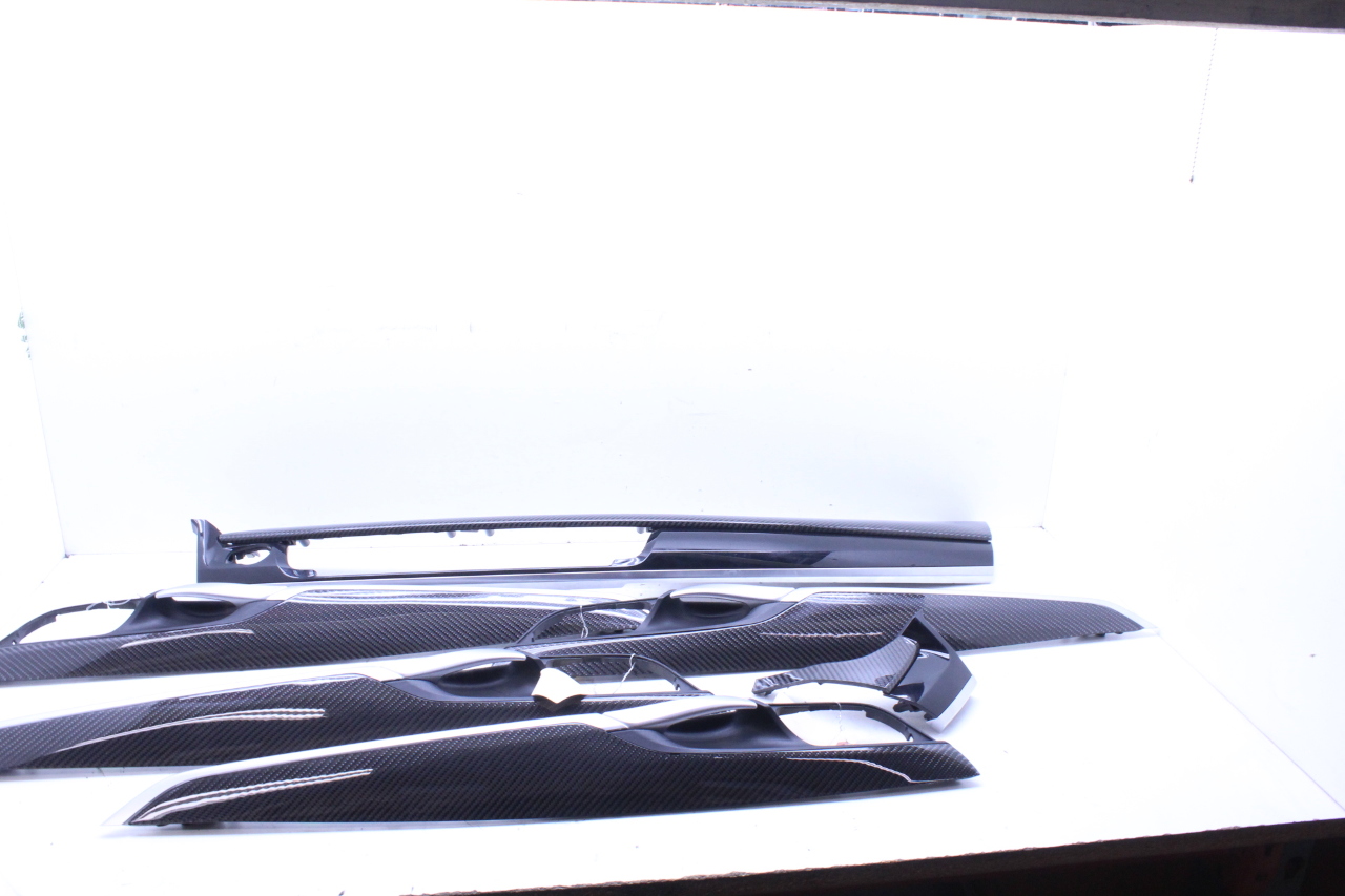 2016 BMW X5M F85 Door Panel Dash Carbon Fiber Set Pieces has some damage OEM
