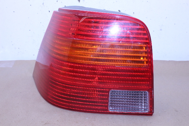 1999-2004 Volkswagen Golf Driver Left Tail Light 1J6945111F Stock#20352 OEM