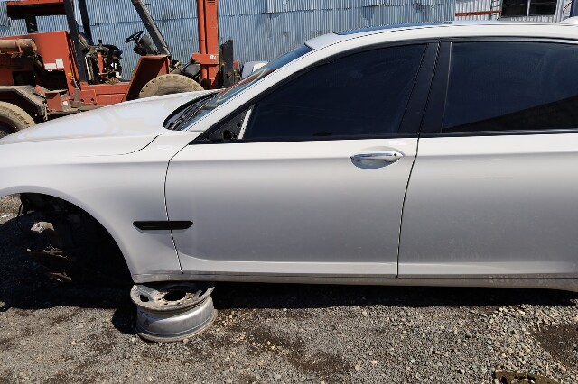 2009-2015 BMW 740i 750i Left Front Door Shell White 41007203977 OEM Used