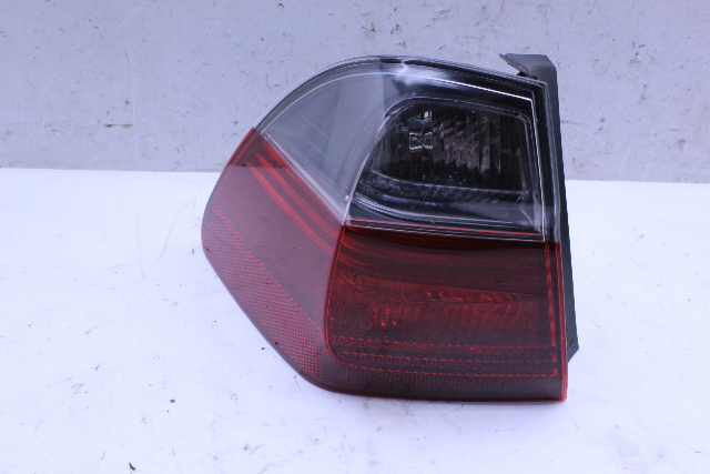 2006 BMW 325xi Tail Light Lamp Left OEM