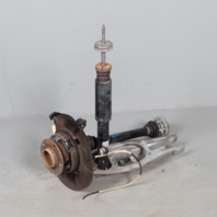 2008-2013 BMW 128i Left Rear Suspension Knee Spindle Control Arm Axle OEM Used