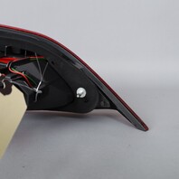 2012-2015 BMW X1 E84 Tail Light Left Lid Mount 63212990113 OEM Used