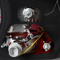 2009-2012 BMW 740i 750i Left Tail Light Lid Mount 63217182205 OEM Used