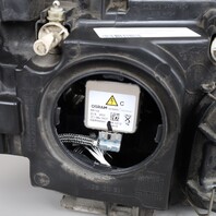 2013-2015 BMW X1 E84 Left Headlight Xenon 63117290271 OEM Used Broken Tabs