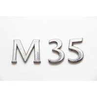 Infiniti M35 Emblem Logo Trunk Deck Luggage Lid "M35" 84896-EH000 OEM 06-08 2006, 2007, 2008 Infiniti M35 Emblem Logo Trunk Deck Luggage Lid "M35" 84896-EH000 OEM 06-08 2006, 2007, 2008