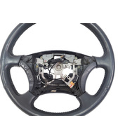 2003-2005 Toyota 4Runner Wheel Black Leather 45100-58010-B0, F042, OEM, 2003, 2004, 2005,