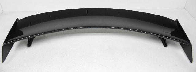 Blemished Has some surface scratches and marks, see photos. Carbon Fiber Rear Spoiler with up right support brackets, but the dogbones (used on the underside of trunk lid) are NOT included. Comes as shown, what you see is what you get. Please match part numbers before purchasing.** ### Photos ![