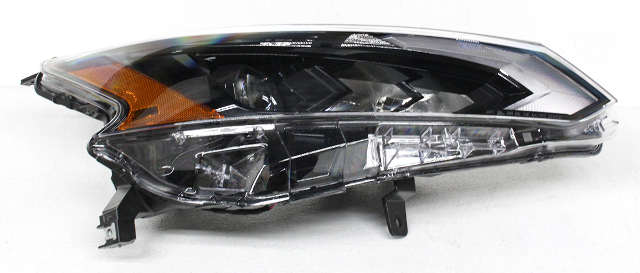 Blemished Right (passenger) side headlamp, LED type with Dark bezel. Lens surface may have marks from storage and handling. May have other minor imperfections. Please match part numbers before purchasing.** ### Photos ![