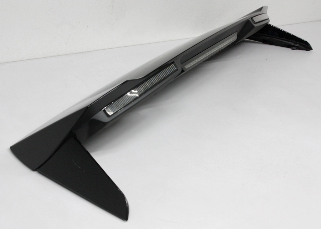 Blemished 3rd brake lamp has a small chip - not seen after install and it doesn't leak. Rear Upper Liftgate mounted spoiler with 3rd brake lamp and flashing emergency lights. ONLY for Special Services Vehicles SSV models. NOTE: Part is painted, but has scratches and may need to be refinished or repainted at the buyers discretion. May have other minor imperfections. The color of the part can look different, on different monitors. Please match part numbers and double check the color before purchasing.** ### Photos ![