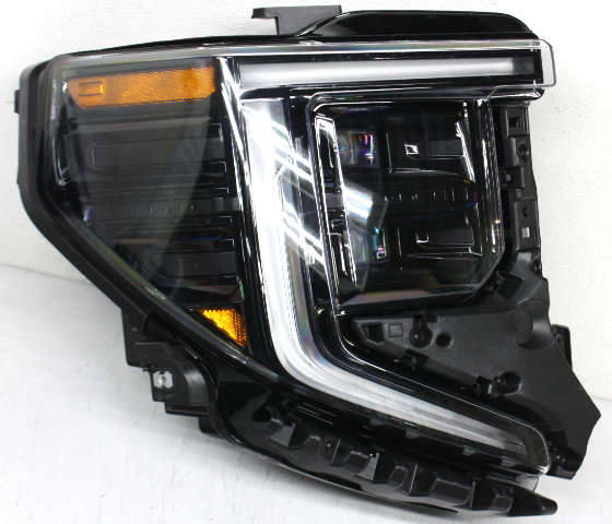 Blemished Upper middle mount tab is missing. FITMENT NOTES: LED projector type headlamp, with dark chrome inner bezel. ONLY for AT4 and AT4X models. WARNING: For proper functionality, system may require dealer level programming after installation. Lens surface may have marks. May have other minor imperfections. It may have marks from storage and handling but overall in excellent working condition. The color of the part can look different, on different monitors. Please match part numbers and double check the color before purchasing.** ### Photos ![