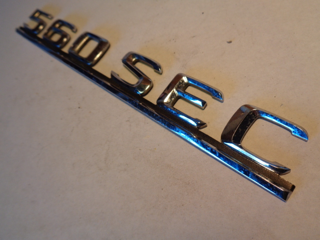 91 Mercedes W126 Coupe 560SEC emblem, on trunk lid 560SEC 1268172415 OEM
