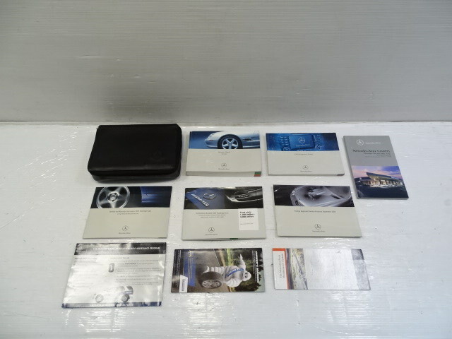 05 Mercedes R230 SL55 owners manual wth case 2305844582