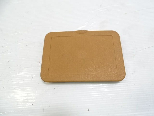 85 Mercedes R107 380SL trim, fuse box cover, palomino, passenger footwell, 1075452800