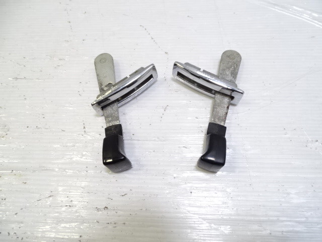 85 Mercedes R107 380SL seat back release levers, left and right