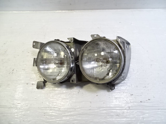 85 Mercedes R107 380SL lamp, headlight, left 1305523033
