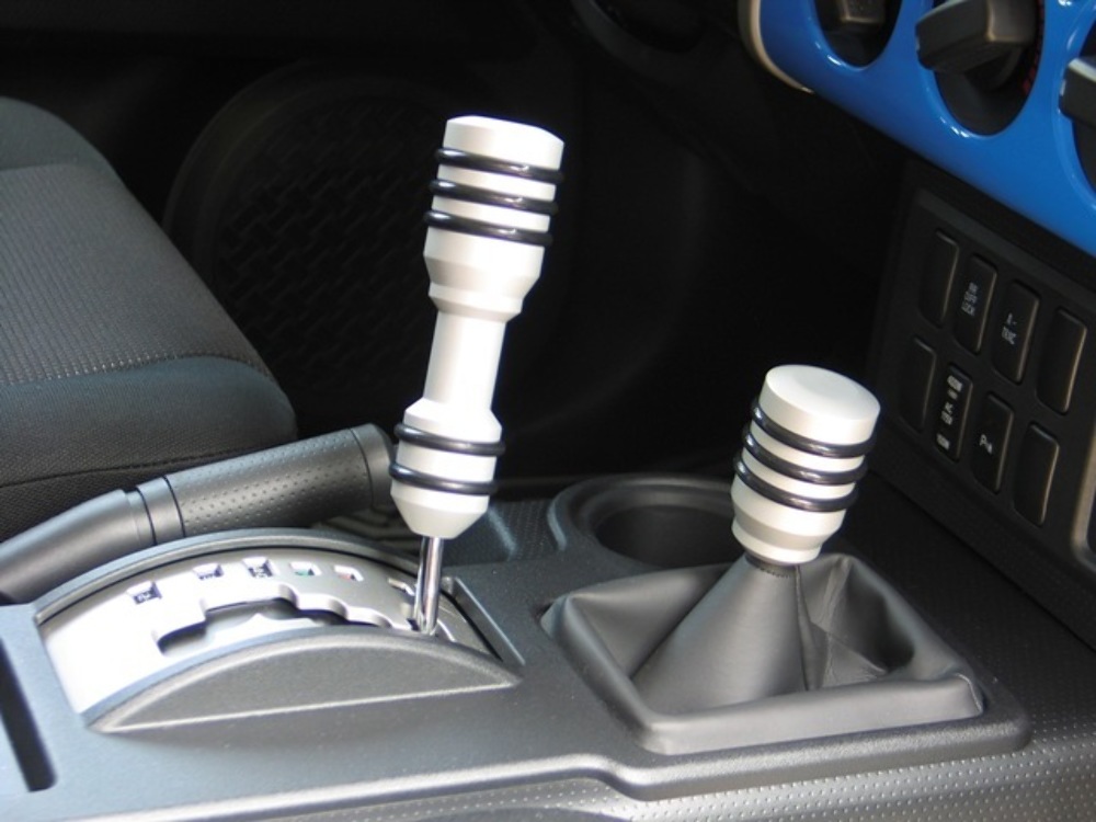 thumbnail image 2 of OEM Toyota FJ Cruiser Shift Lock Release Button Cover Cap - 2007-2014 - Silver 2 of 5