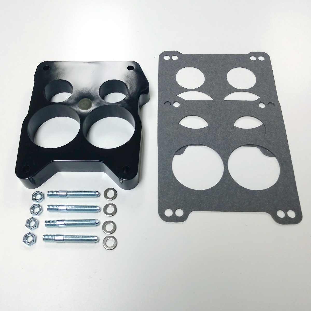 1" Phenolic Carburetor Spacer, Quadrajet 4BBL Hole Ported w/ Gaskets