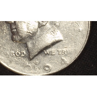 1994-D Kennedy Half Dollar 50c - Strike through grease error