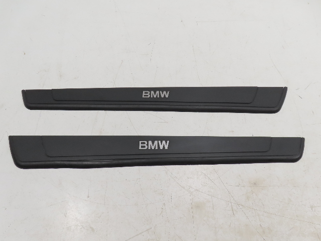 07 BMW Z4 E85 #1311 Trim Pair, Door Sill, Black OEM 7016653 7016654