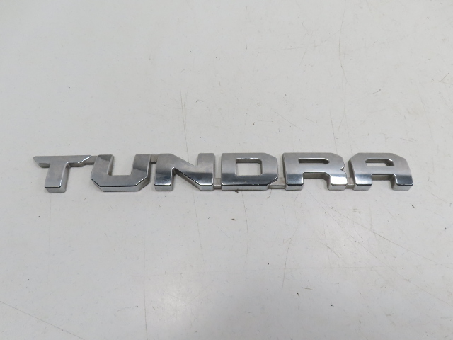 15 Toyota Tundra Crewmax #1318 emblem, door badge "Tundra" chrome left front 75471-0C150