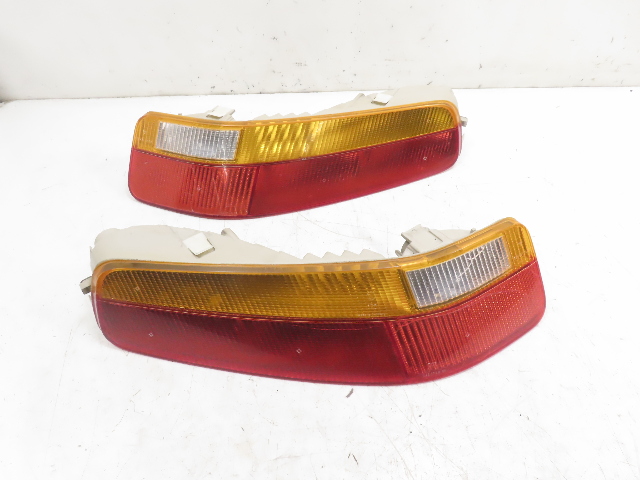 87 Porsche 928 S4 #1331 Taillight Pair Left & Right OEM 92863148301 92863148401