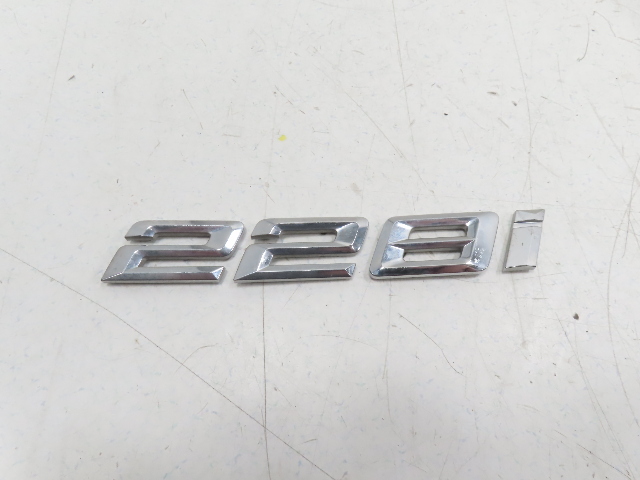21 BMW F44 228 xi #1339 Emblem, Trunk Model Badge (228i) 51149491008 OEM