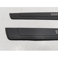 07 BMW Z4 E85 #1311 Trim Pair, Door Sill, Black OEM 7016653 7016654