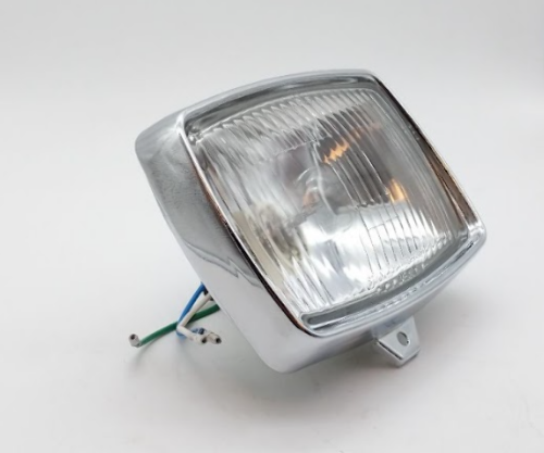 1984-1985 Honda ATC200 New OEM Headlight Unit W/ Bezel HONDA 33100